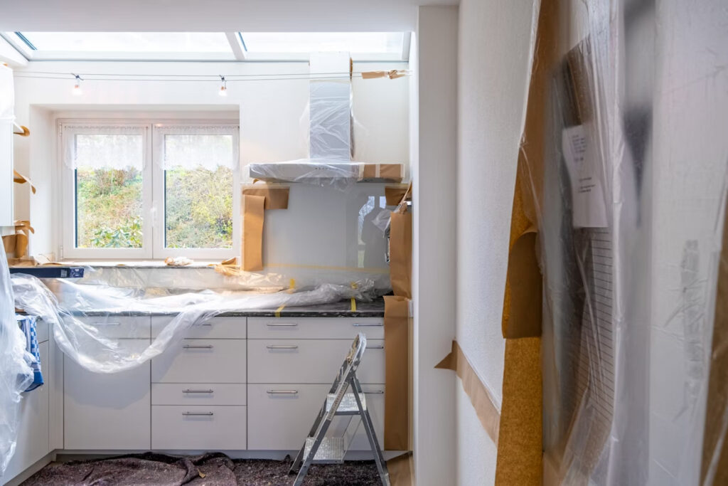 A-kitchen-in-renovation-covered-in-paper-and-plastic